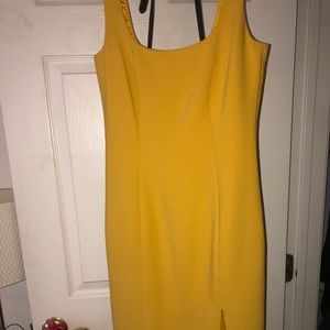 Beautiful Yellow midi dress with thigh split